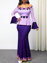 Langärmliges, figurbetontes Maxikleid mit Blumendruck und Rüschen