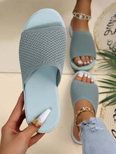 Gestrickte flache Hausschuhe