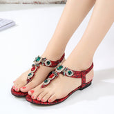 Flache Sandalen mit Kristall-Strass