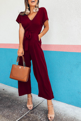 Einfarbiger Bandage-Jumpsuit mit V-Ausschnitt und Bootcut