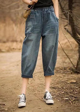 Italienische Jeansblaue Baumwoll-Crop-Hose mit elastischer Taille und asymmetrischen Taschen
