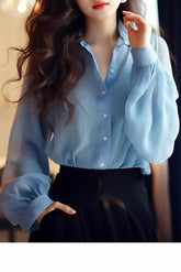 Bluse mit Netzeinsatz und Knopfleiste vorne