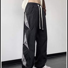 Fallschirmhose mit Reißverschluss und weitem Bein