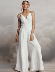 Weißer Jumpsuit mit V-Ausschnitt und Stickerei