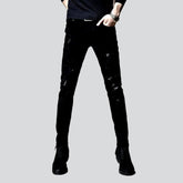 Schwarze zerrissene Jeans mit Flicken für Herren