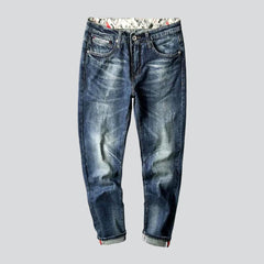 Vintage-Jeans für Herren mit bedruckten Taschen