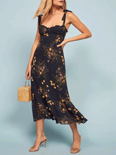 Maxikleid mit Rüschen und Strumpfhaltern und Blumenmuster