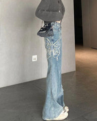 High Rise Flare Jeans mit Schmetterlings-Print