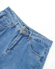 Sirius – Ausgestellte Jeans aus zerrissenem Denim