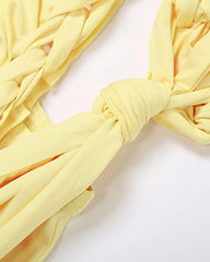 Tanigrei – Tief ausgeschnittenes Statement-Minikleid