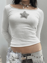 Kurz geschnittenes Stricktop mit langen Ärmeln und Stern-Patch