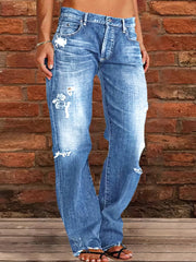 Lässige, gerade geschnittene Stretch-Jeans mit Rissen und Waschung