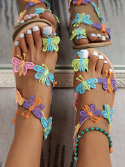 Strandsandalen mit Zehenring und Schmetterlingsmuster