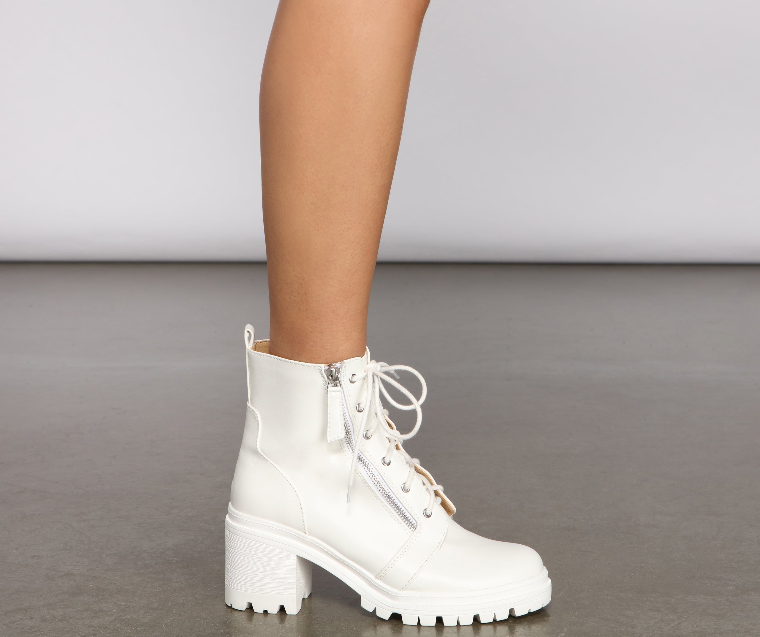 Edgy and Chic Faux Leather Lug Booties Newgew