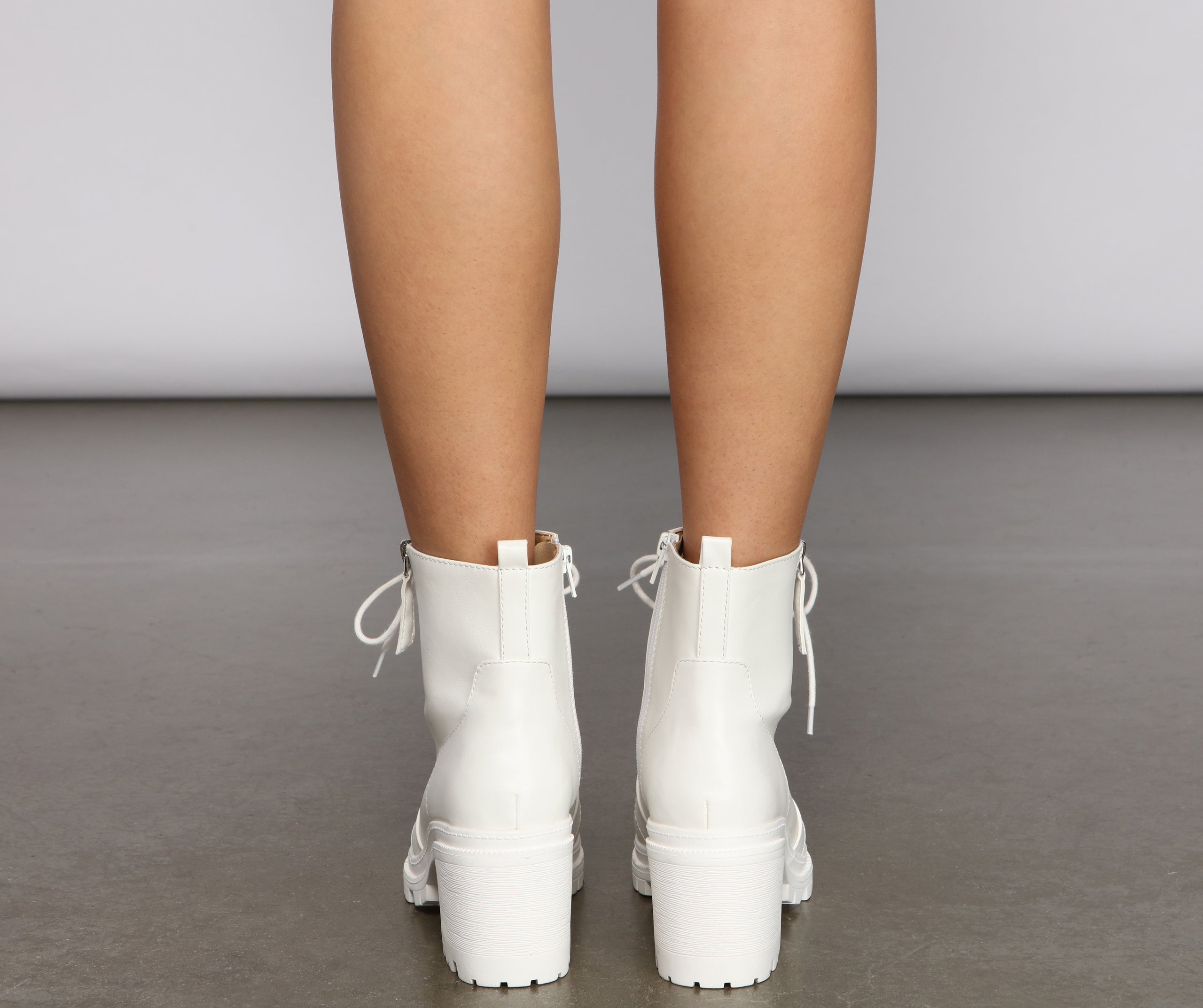 Edgy and Chic Faux Leather Lug Booties Newgew