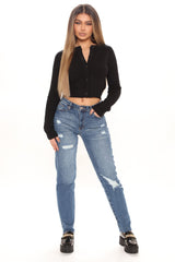 Survival Of The Fittest – Zerrissene Boyfriendjeans – Dunkle Waschung