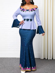 Langärmliges, figurbetontes Maxikleid mit Blumendruck und Rüschen