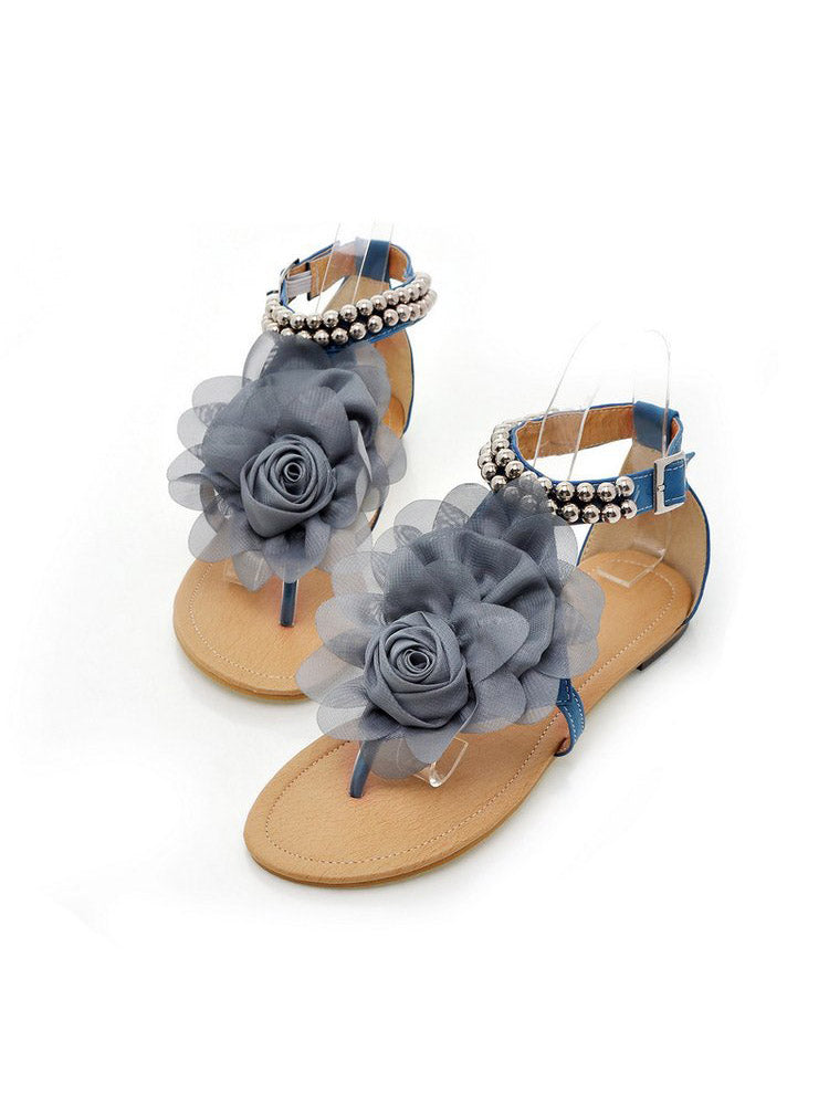 Flache Sandalen mit Blumen-String-Perlen und Knöchelriemen