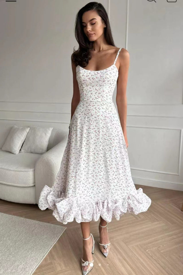 Vestido midi con bustier y volantes