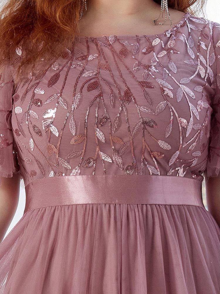 Partykleid aus Netzstoff mit Blatt-Pailletten-Mieder