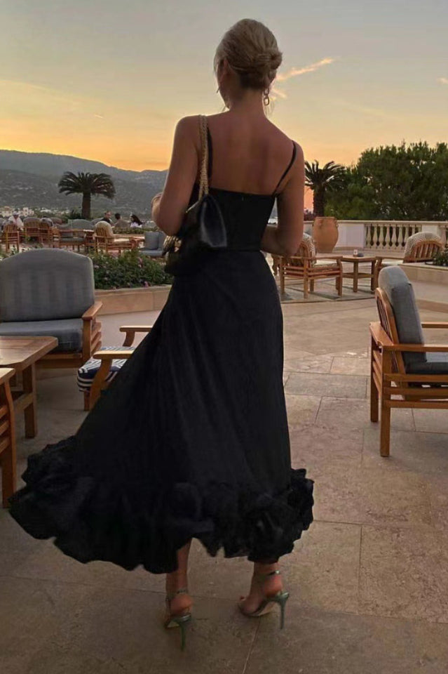 Vestido midi con bustier y volantes