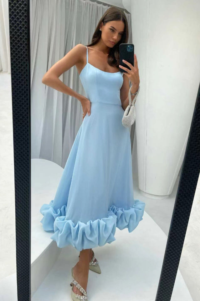 Vestido midi con bustier y volantes
