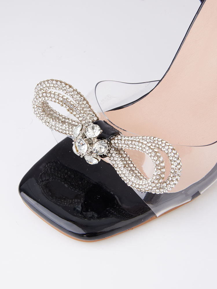Tacones altos con punta cuadrada y lazo brillante