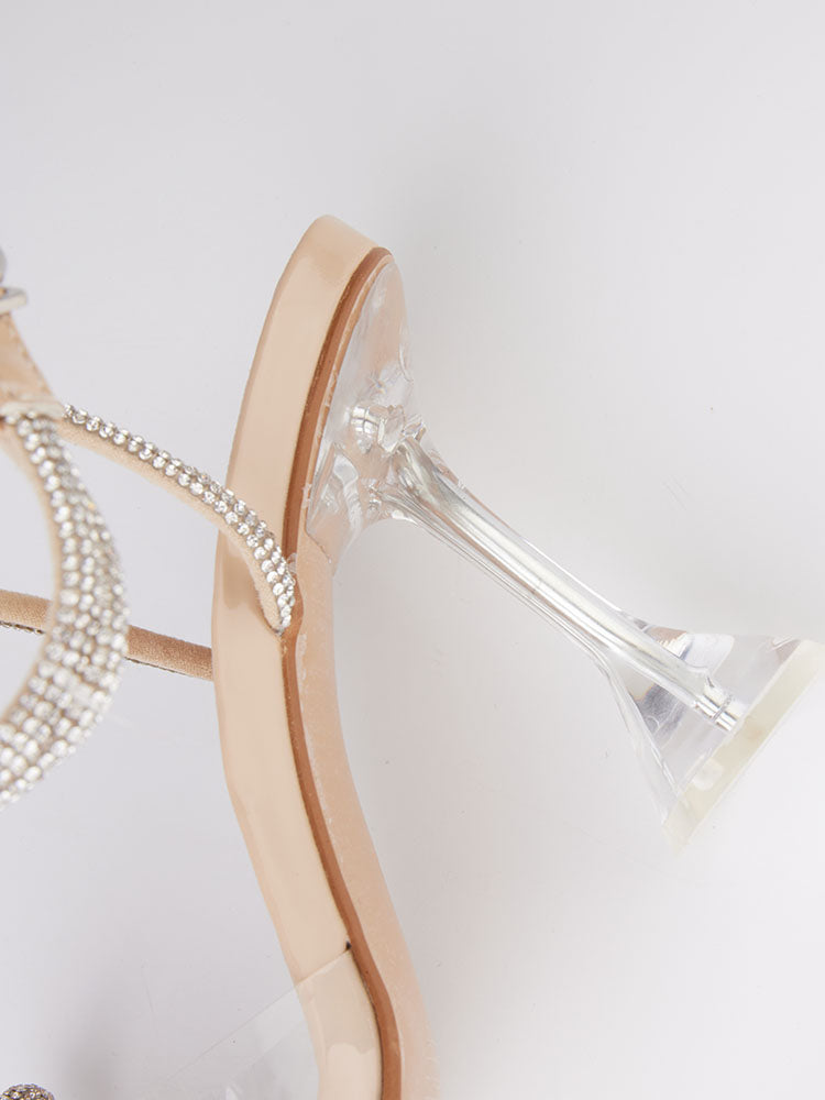Tacones altos con punta cuadrada y lazo brillante