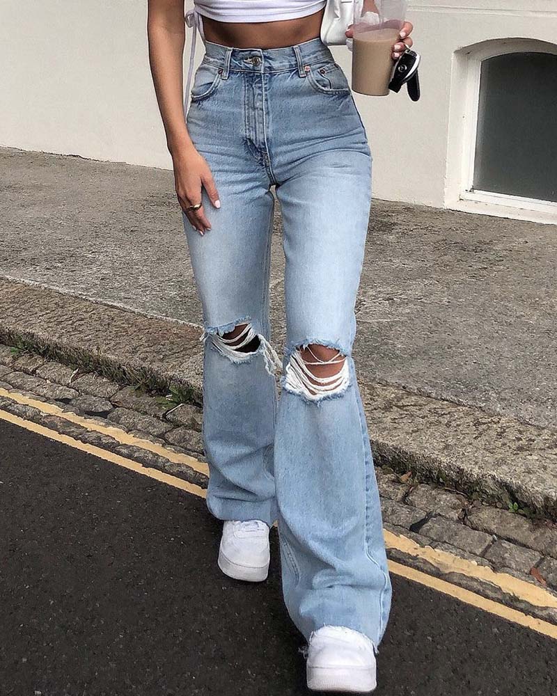 Sirius – Ausgestellte Jeans aus zerrissenem Denim
