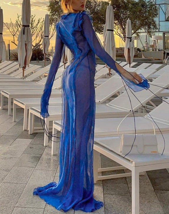 Vestido largo con abertura y corazón palpitante 