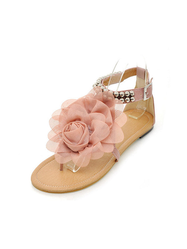 Flache Sandalen mit Blumen-String-Perlen und Knöchelriemen