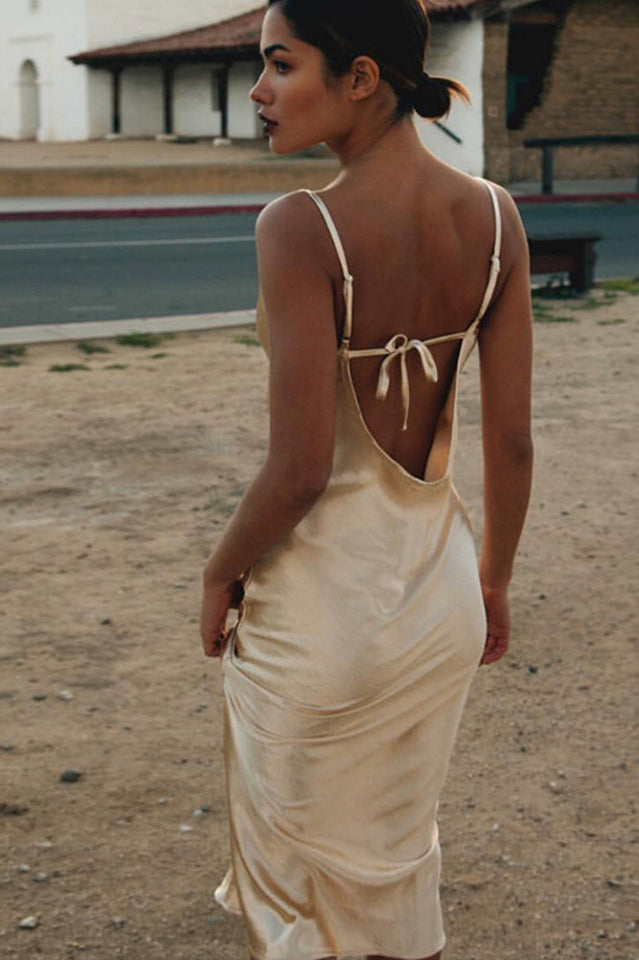Elegantes, figurbetontes Partykleid mit offenem Rücken