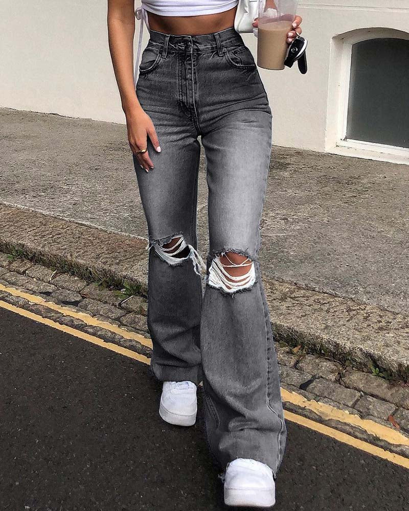 Sirius – Ausgestellte Jeans aus zerrissenem Denim