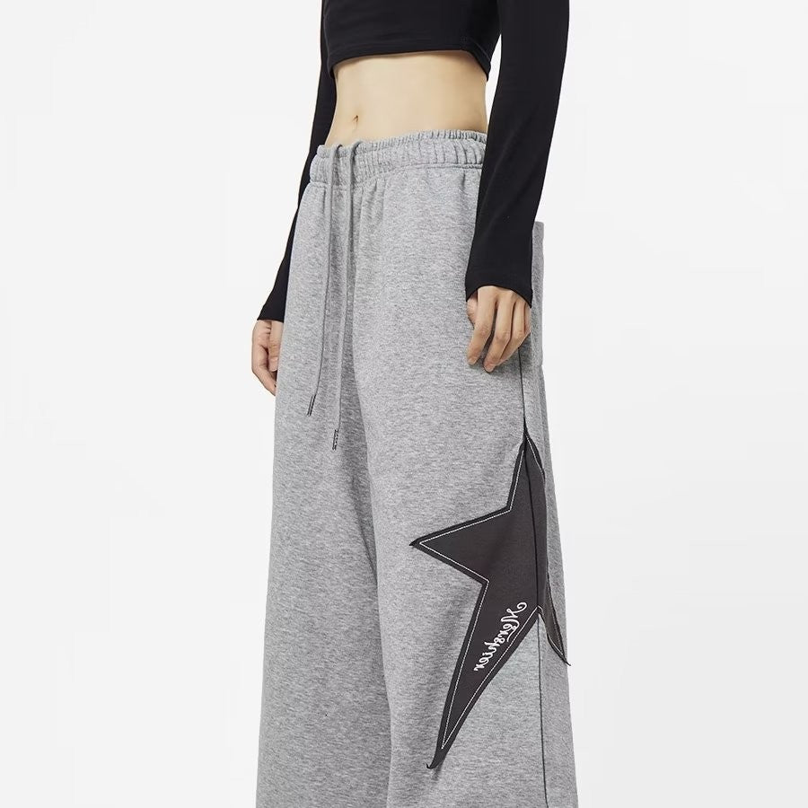 Graue Baggy-Jogginghose mit Stern-Patch