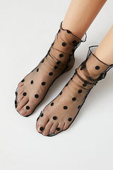 Durchsichtige Netzsocken mit Punkten