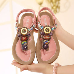 Sandalen mit flachem Absatz und Knöchelriemen