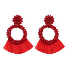 Pendientes bohemios con borlas geométricas y cuentas 