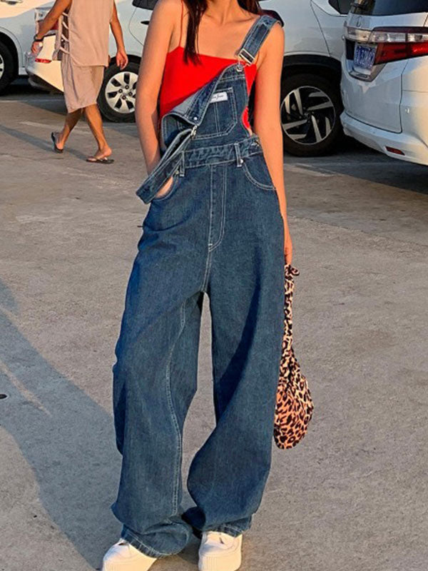 Blauer Boyfriend-Jeans-Latz mit Vintage-Waschungseffekt