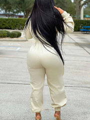 Jumpsuit mit tiefem V-Ausschnitt und Reißverschlusstasche