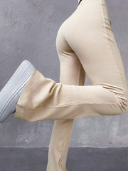 Pantalones acampanados de canalé elástico