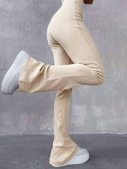 Pantalones acampanados de canalé elástico