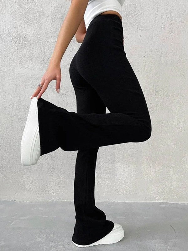 Pantalones acampanados de canalé elástico