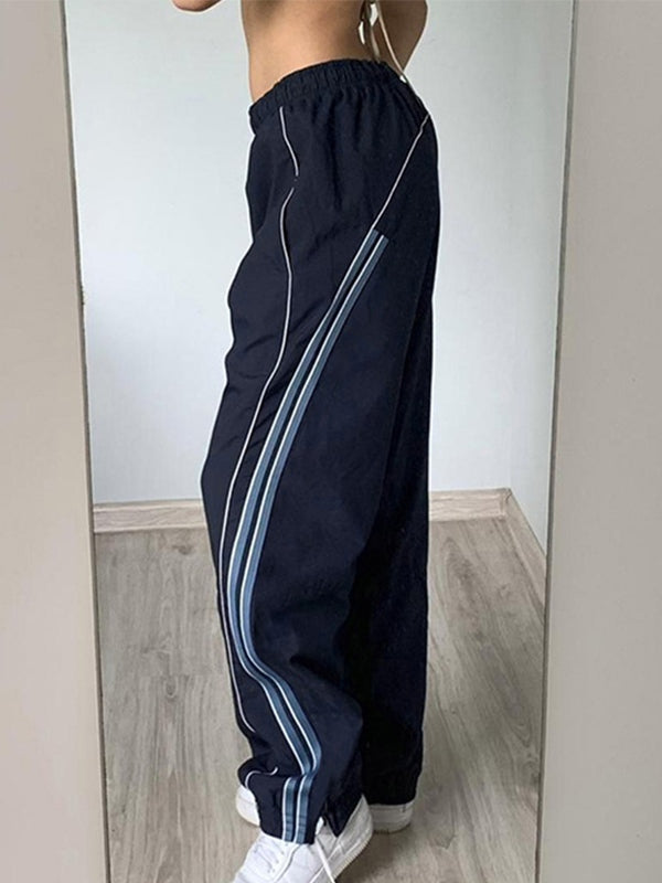Pantalones deportivos holgados con ribete de rayas vintage
