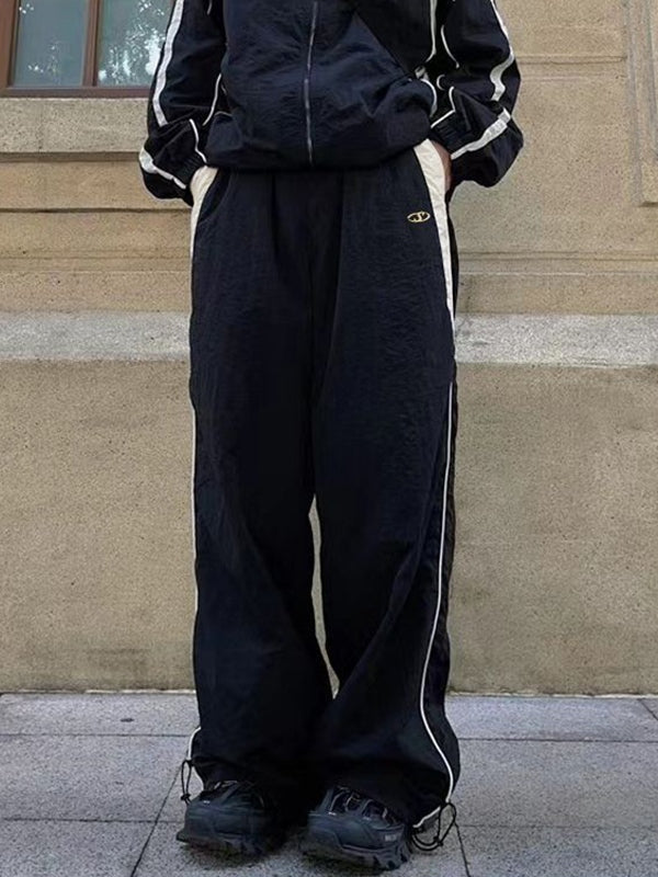 Lockere Fallschirmhose mit Kontrasteinsätzen für Herren