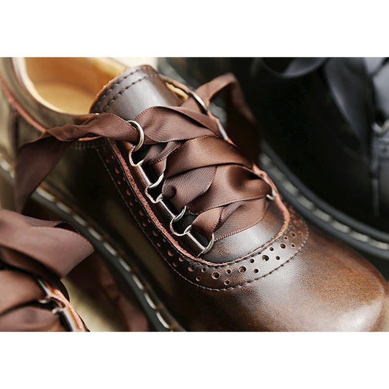 Oxford-Schuhe mit runder Zehenpartie und Retro-Schleife