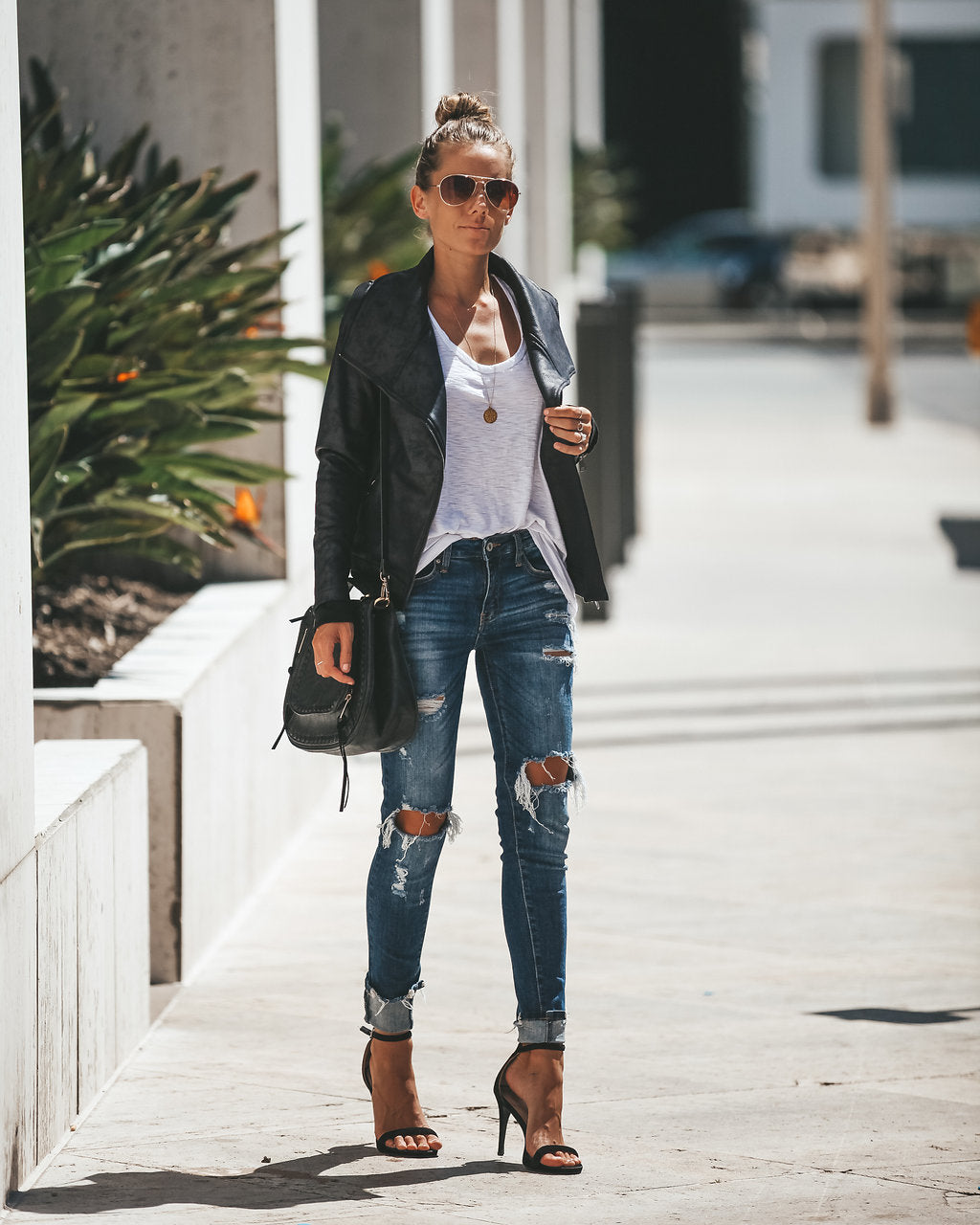 Slick Chick – Beschichtete Motorradjacke aus Kunstleder – Schwarz