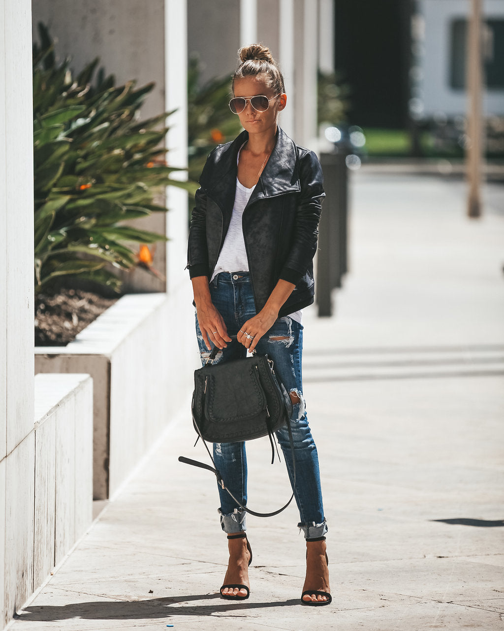 Slick Chick – Beschichtete Motorradjacke aus Kunstleder – Schwarz