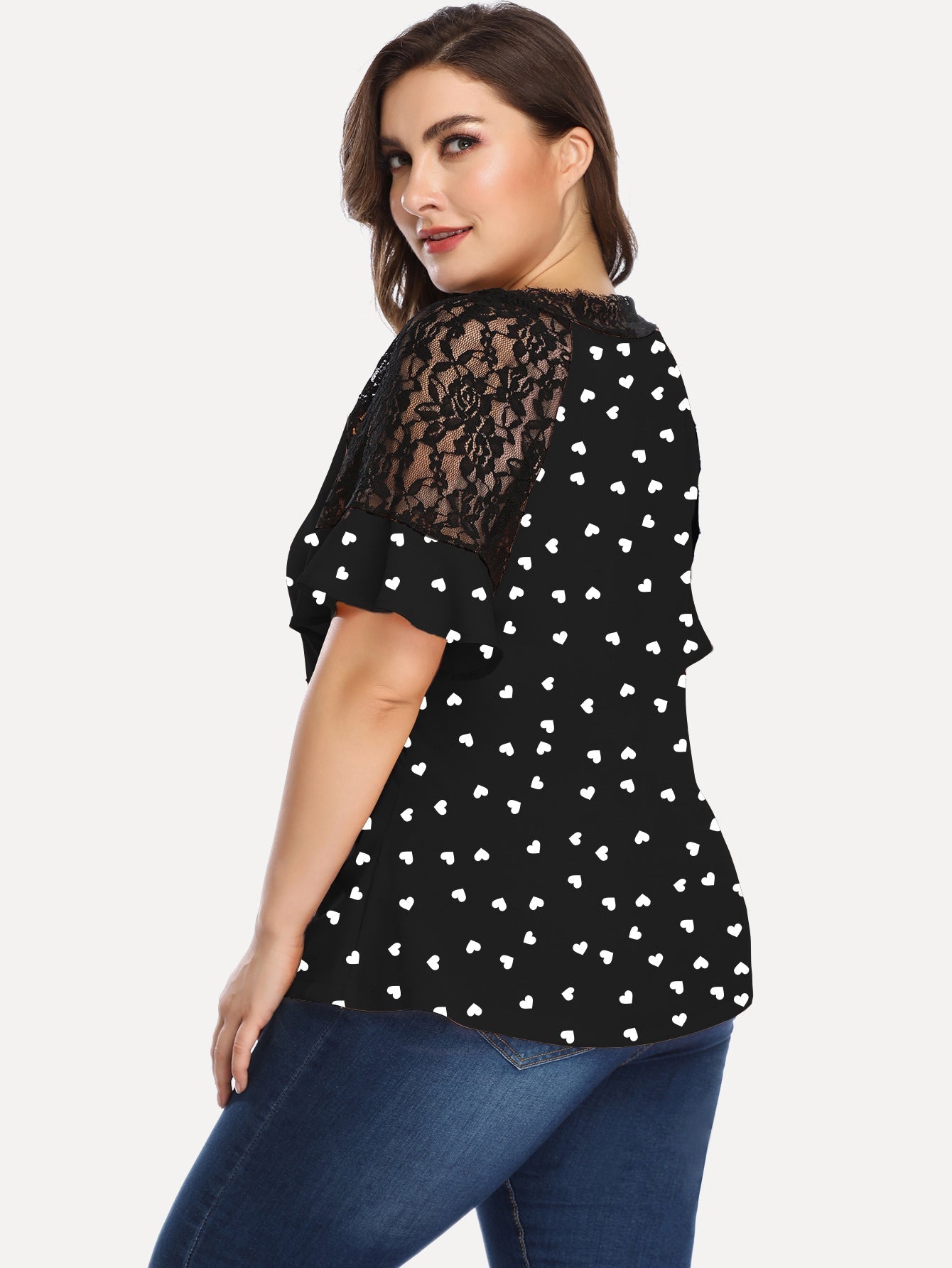 Camiseta de manga corta con lunares y mangas huecas informal