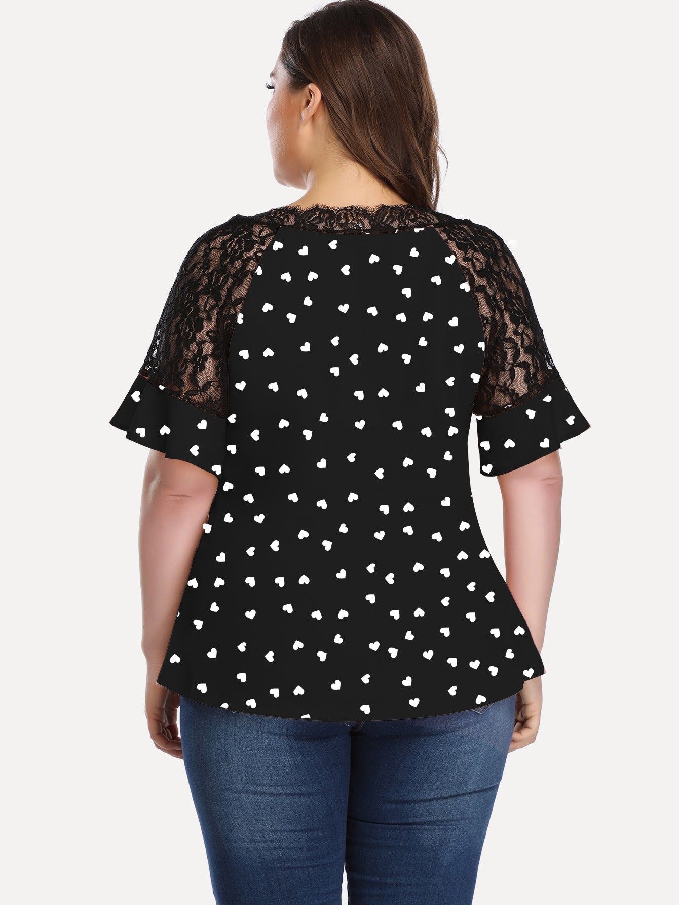 Camiseta de manga corta con lunares y mangas huecas informal
