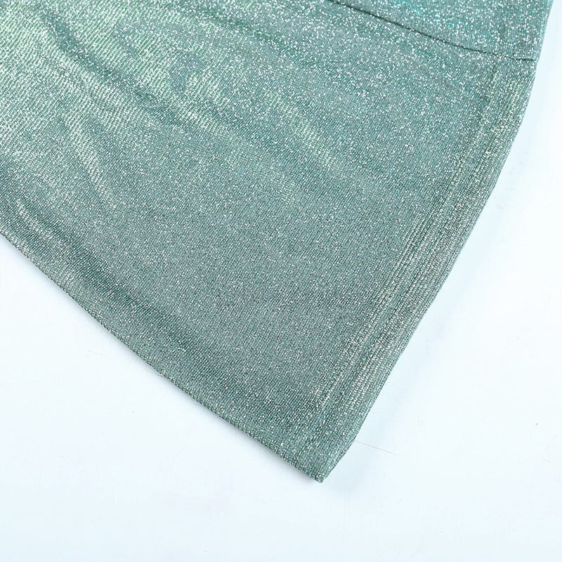 Minivestido verde con tirantes y lentejuelas en la espalda